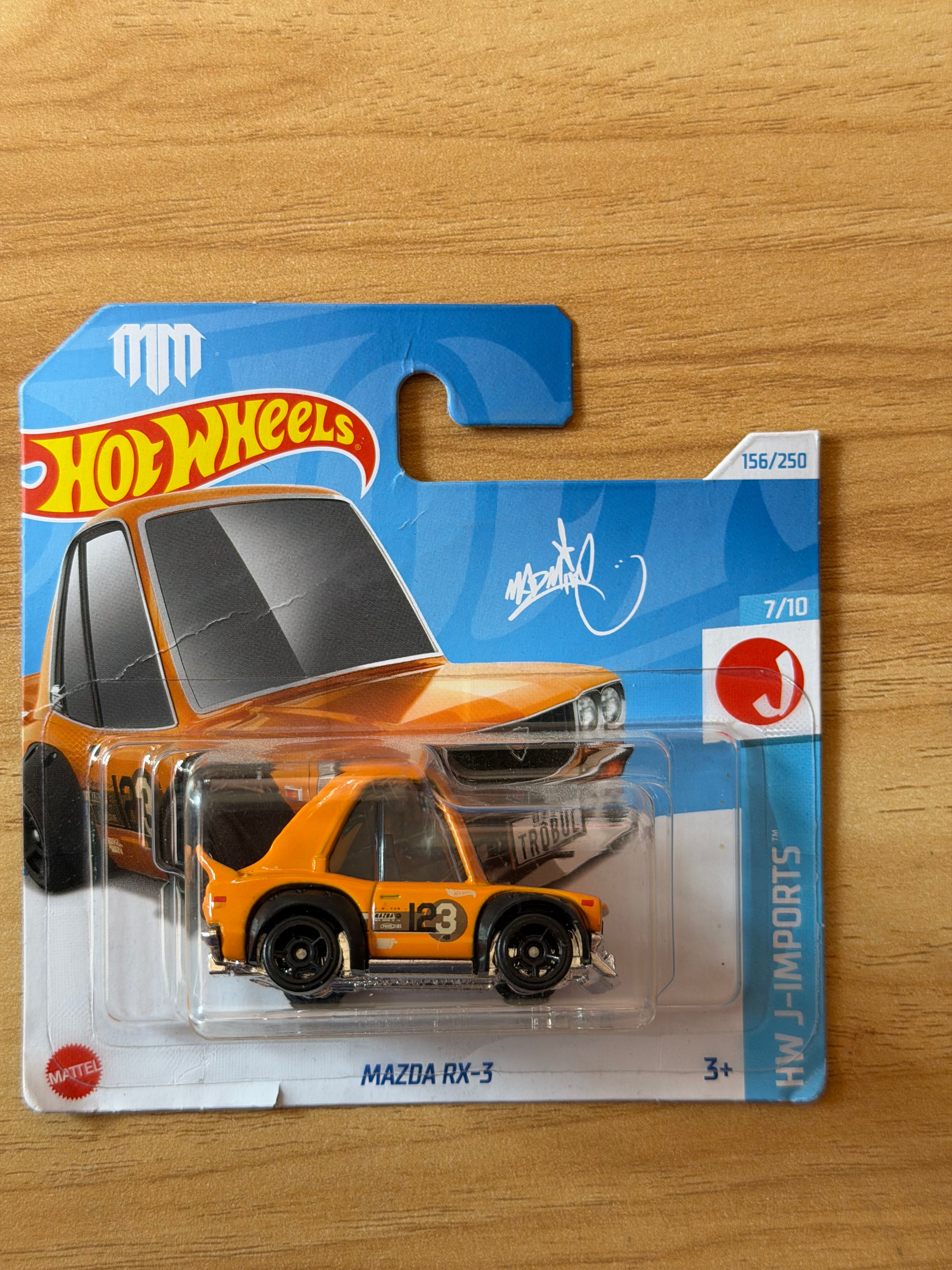 Hot Wheels – Mazda RX-3 (Naranja #23)